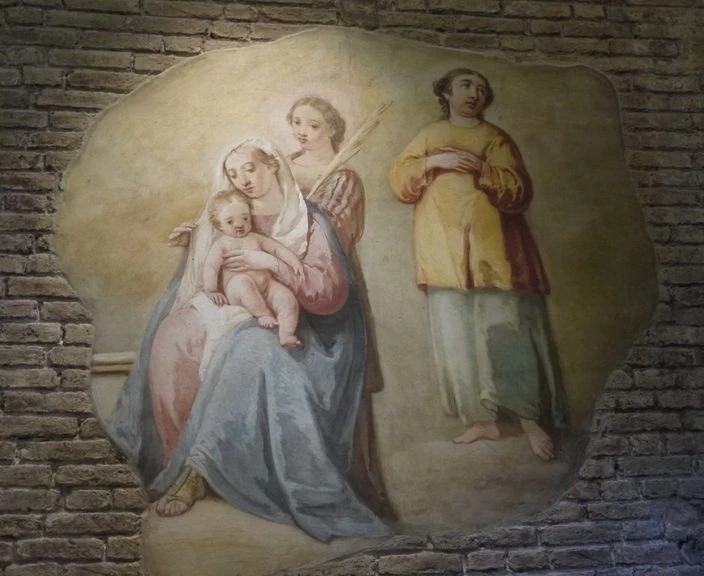 La Vergine col Bambino e santa